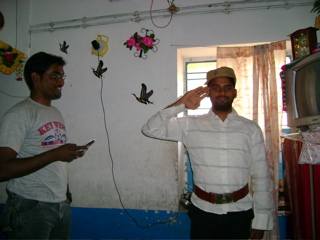 Sandeep visiting his best friend and trying on some police gear